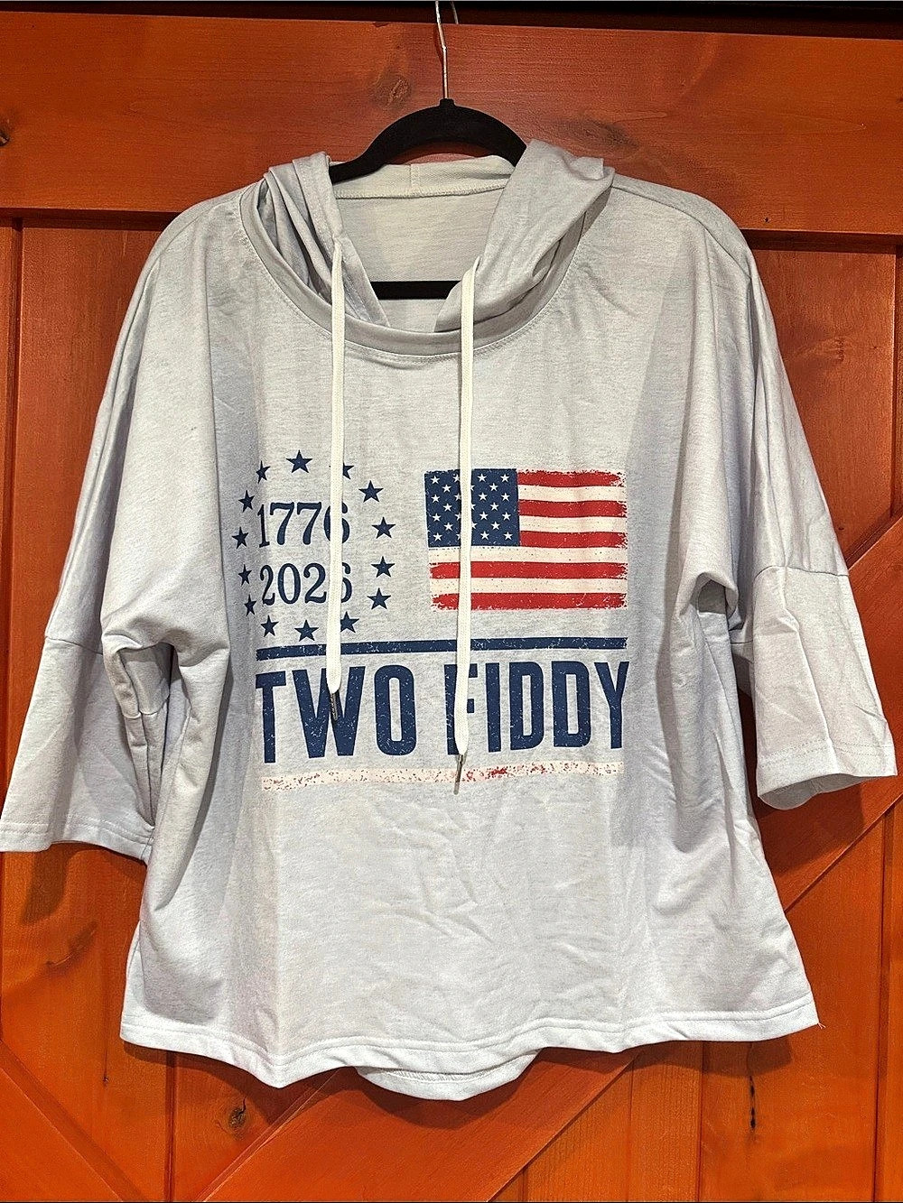Two Fiddy 1776-2026 Patriotic Graphic Short-Sleeve Hoodie in light Blue